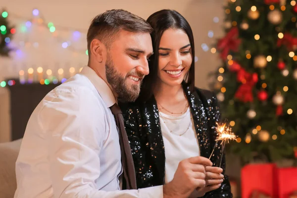 Young Couple Sparklers Celebrating Christmas Home — Stock Photo, Image