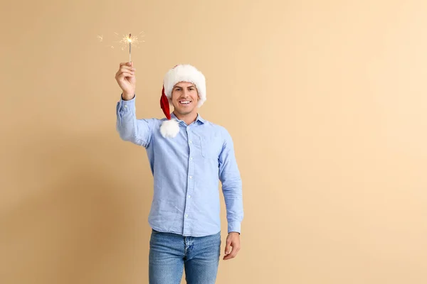 Handsome Young Man Christmas Sparklers Color Background — Stock Photo, Image