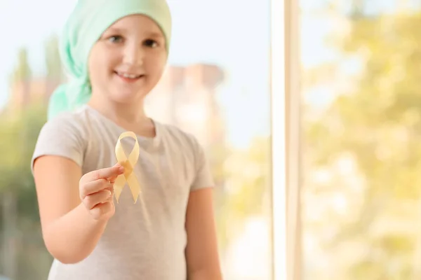 Little Girl Golden Ribbon Clinic Childhood Cancer Awareness Concept — Stock Photo, Image