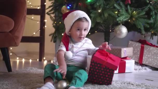 Little Baby Boy Gift Christmas Tree Home — Stock Video