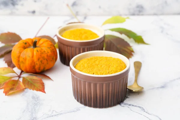 Tasty pumpkin pudding on table