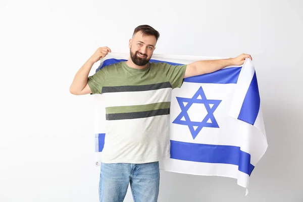 Hombre Con Bandera Israel Sobre Fondo Claro —  Fotos de Stock