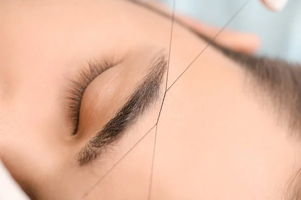 Young Man Undergoing Eyebrow Correction Procedure Beauty Salon Closeup — Stock Photo, Image