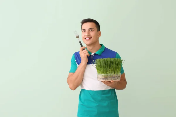 Young Man Wheatgrass Color Background — Stock Photo, Image