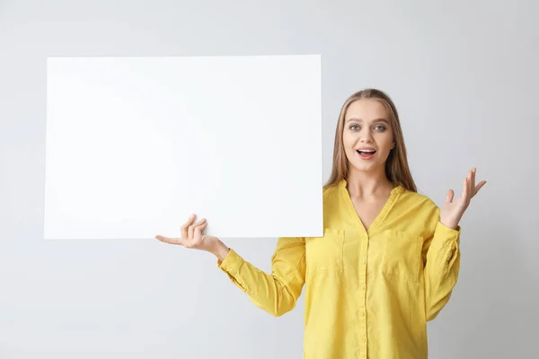 Surprised Young Woman Blank Poster Grey Background — Stock Photo, Image