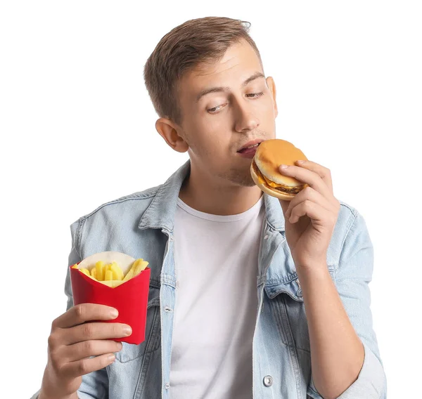 Junger Mann Mit Pommes Und Burger Auf Weißem Hintergrund — Stockfoto