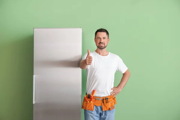 Worker Repair Service Showing Thumb Fridge Color Background — Stock Photo, Image