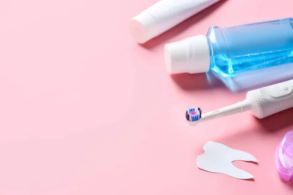 Set for oral hygiene on color background