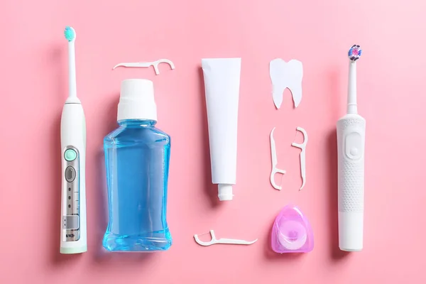 Set for oral hygiene on color background