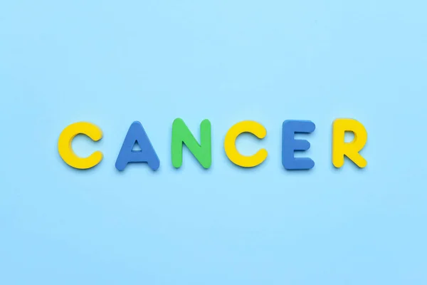 彩色背景下的单词Cancer — 图库照片