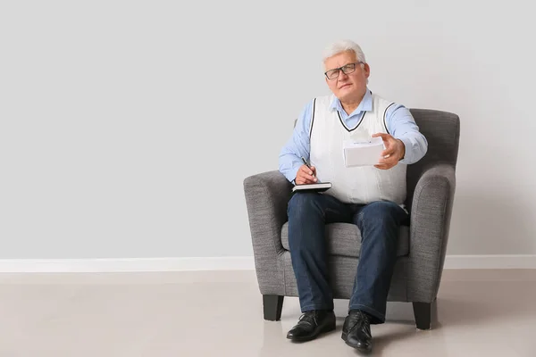 Male Psychologist Sitting Armchair Light Wall — Stock Photo, Image