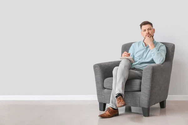 Male Psychologist Sitting Armchair Light Wall — Stock Photo, Image