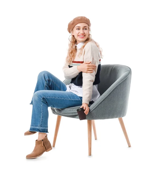 Mulher Bonita Roupas Quentes Sentada Cadeira Contra Fundo Branco — Fotografia de Stock