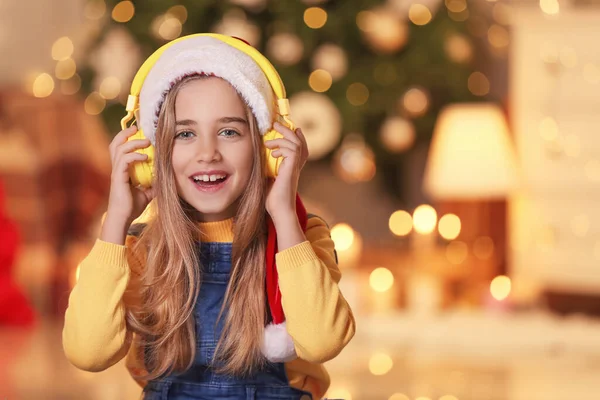 Cute Little Girl Listening Christmas Music Home — Stock Photo, Image