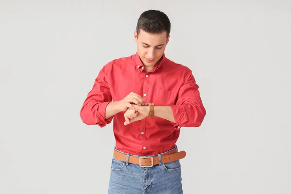 Young Man Wristwatch Light Background — Stock Photo, Image