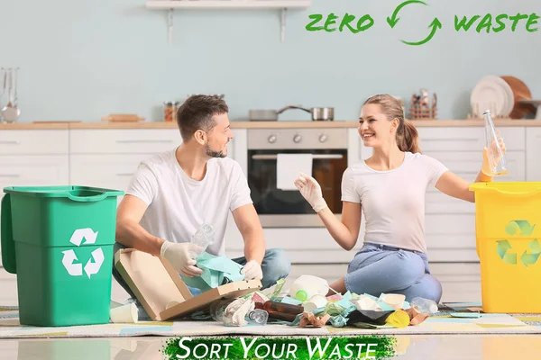 Couple sorting garbage at home. Concept of recycling