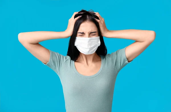 Stressed Young Woman Medical Mask Color Background — Stock Photo, Image