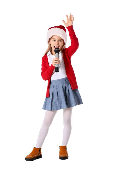 Nettes Kleines Mädchen Mit Weihnachtsmütze Singt Weihnachtslied Auf Weißem Hintergrund — Stockfoto