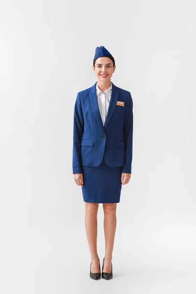 Mooie Stewardess Lichte Achtergrond — Stockfoto