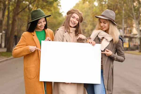 Beautiful Young Women Blank Poster Outdoors — Stock Photo, Image