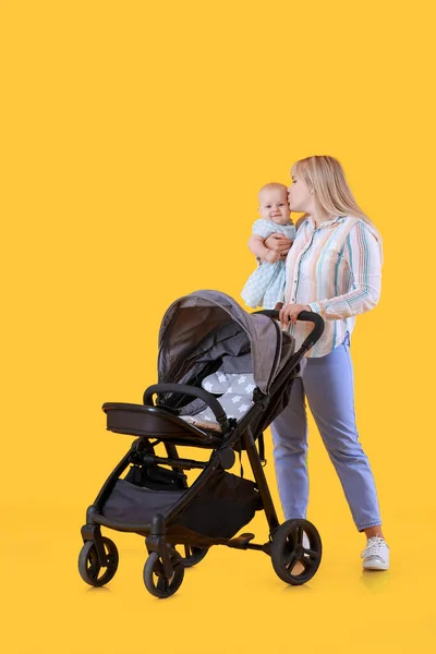 Woman Her Cute Baby Stroller Color Background — Stock Photo, Image