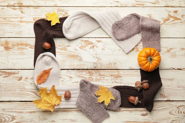 Frame Made Warm Socks Autumn Leaves Wooden Background — Stock Photo, Image