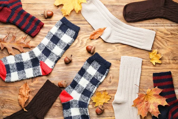 Warm Socks Autumn Leaves Wooden Background — Stock Photo, Image