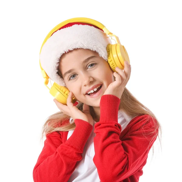 Χαριτωμένο Κοριτσάκι Ακούγοντας Χριστουγεννιάτικη Μουσική Λευκό Φόντο — Φωτογραφία Αρχείου