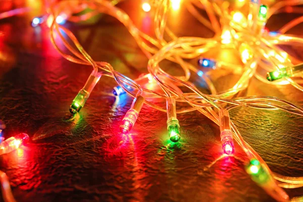 Glowing Christmas Lights Dark Background Closeup — Stock Photo, Image