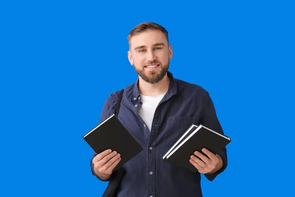 Young Man Books Color Background — Stock Photo, Image