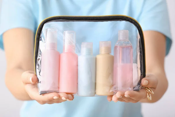 Female Hands Travel Cosmetics Kit Light Background — Stock Photo, Image