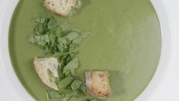 Plate of tasty spinach cream soup, closeup — Stock Footage Plate Tasty Spinach Cream Soup Closeup Video Clip