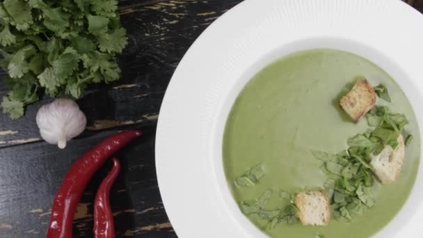 Plate of tasty spinach cream soup on table, top view — Stock Footage Plate Tasty Spinach Cream Soup Table Top View Royalty Free Stock Video
