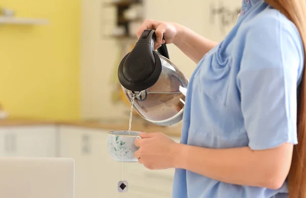 Young Woman Pouring Boiled Water Electric Kettle Cup Kitchen — Stock Photo, Image