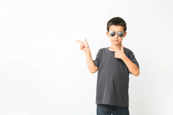 Cute Boy Stylish Sunglasses Pointing Something White Background — Stock Photo, Image