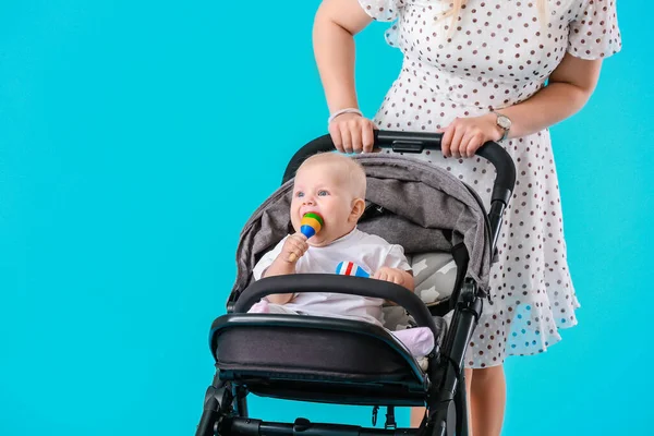 Woman Her Cute Baby Stroller Color Background — Stock Photo, Image