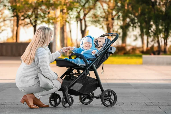 Woman Her Cute Baby Stroller Outdoors — Stock Photo, Image