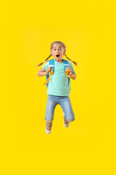 Jumping Little Schoolgirl Color Background — Stock Photo, Image