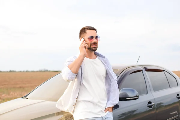 Handsome Man Talking Mobile Phone His Modern Car — Stock Photo, Image