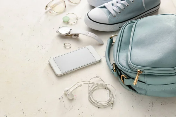 Stylish Bag Accessories Mobile Phone Light Background — Stock Photo, Image