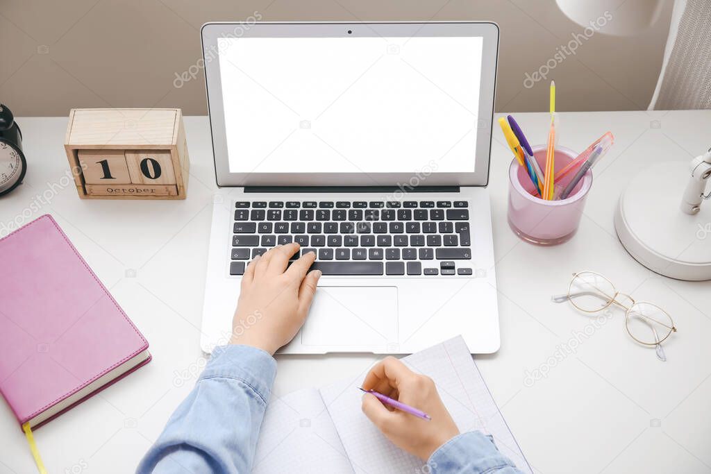 Girl doing homework at home