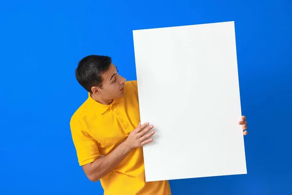 Surprised Young Man Blank Poster Color Background — Stock Photo, Image