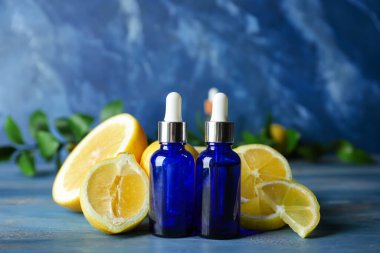 Renkli arka planda limon yağı