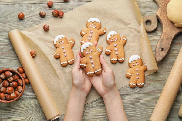 Woman Holding Christmas Gingerbread Cookies Wooden Background — Stock Photo, Image