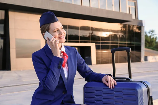 Young Stewardess Talking Phone Outdoors — Stock Photo, Image