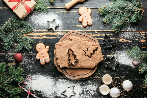 Christmas Composition Fresh Dough Gingerbread Cookies Cutters Dark Wooden Background — Stock Photo, Image