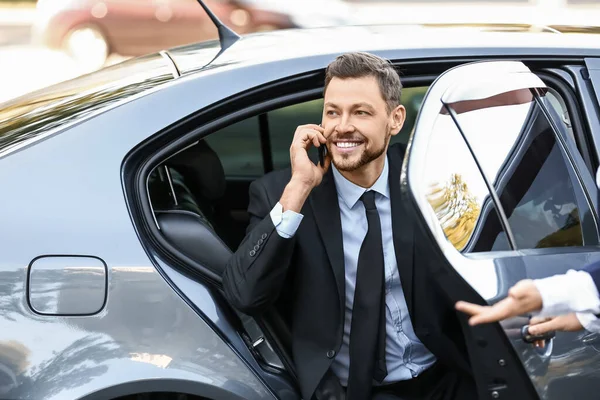 Businessman Getting Out Luxury Car — Stock Photo, Image