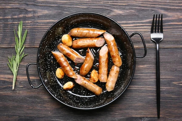 Frying Pan Delicious Grilled Sausages Wooden Table — Stock Photo, Image