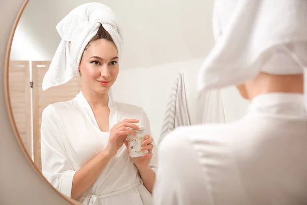 Beautiful Young Woman Applying Coconut Oil Bathroom — Stock Photo, Image