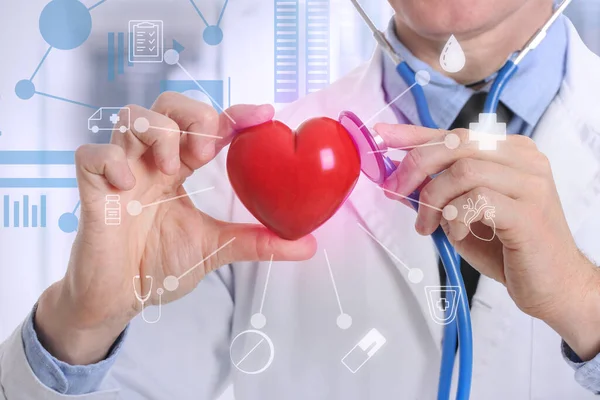 Male Cardiologist Red Heart Clinic Closeup — Stock Photo, Image